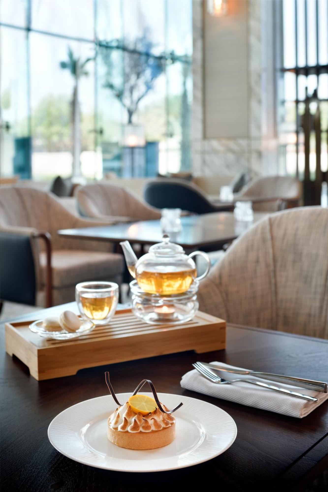 Grand Plaza Moevenpick Hotel Dubai Luaran gambar A glass teapot